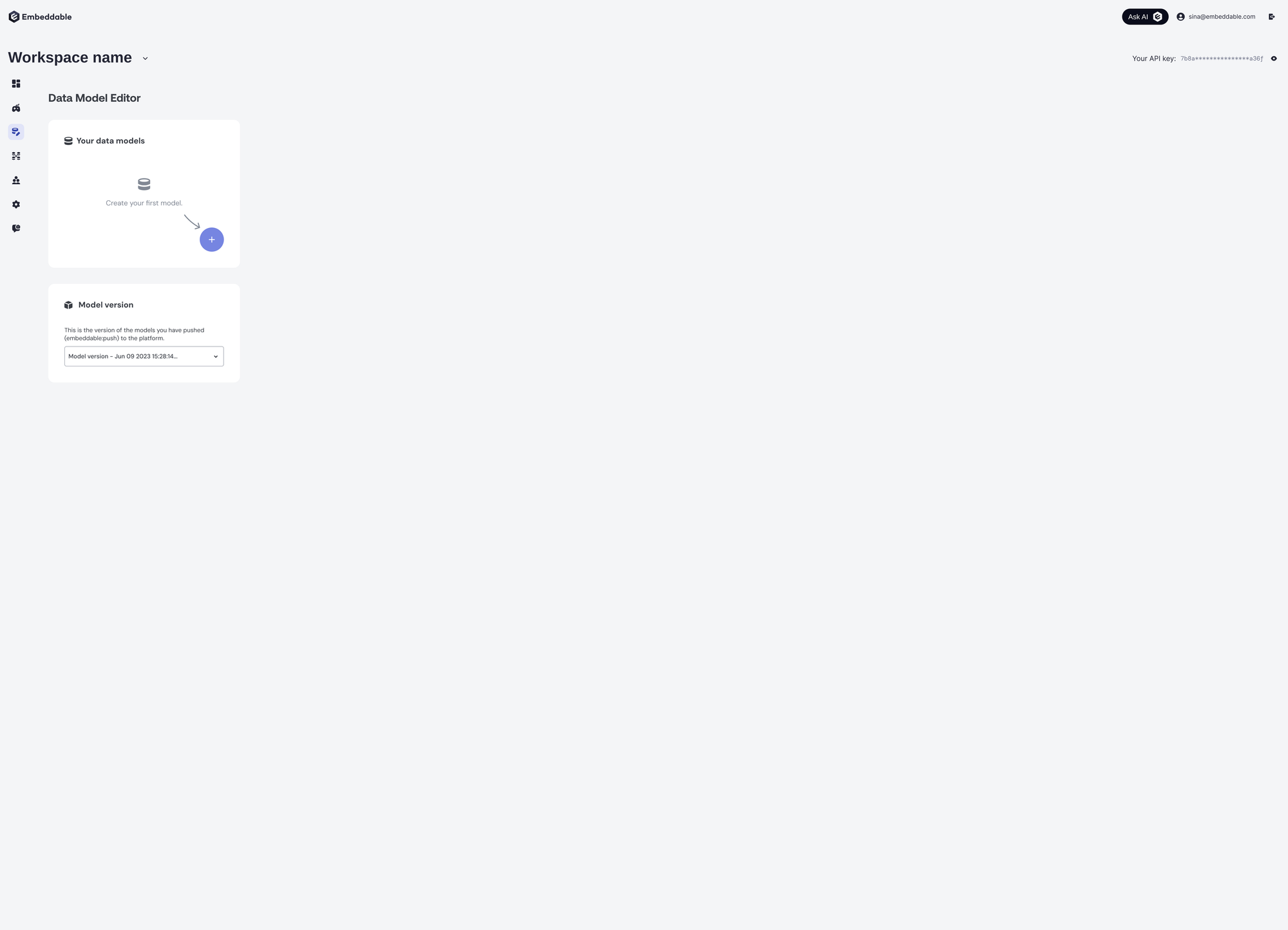 The data model editor on a first visit, with an empty models panel and an arrow pointing at the button that creates the first model.